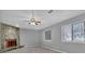 Living room featuring fireplace, ceiling fan and natural light at 3954 Springleaf Pt, Stone Mountain, GA 30083