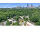 Stunning aerial view of neighborhood homes with the Atlanta skyline in the distance at 405 9Th Ne St, Atlanta, GA 30309