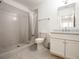 Bathroom featuring a shower, a vanity with double sinks, and neutral color palette for a clean and modern look at 405 9Th Ne St, Atlanta, GA 30309