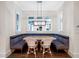 Cozy breakfast nook featuring built-in bench seating and natural light at 405 9Th Ne St, Atlanta, GA 30309