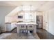 Modern kitchen featuring stainless steel appliances, island seating, and ample storage at 405 9Th Ne St, Atlanta, GA 30309