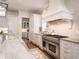 Modern kitchen featuring stainless steel appliances and stone countertops at 405 9Th Ne St, Atlanta, GA 30309