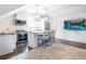 Stylish kitchen with stainless steel appliances, wood countertops, and pendant lighting at 405 9Th Ne St, Atlanta, GA 30309