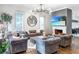 Inviting living room with modern decor, a fireplace, and comfortable seating at 405 9Th Ne St, Atlanta, GA 30309