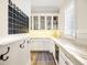 Spacious pantry featuring custom cabinets and a serving counter at 405 9Th Ne St, Atlanta, GA 30309
