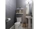 Stylish powder room with modern fixtures, chic decor, and a pedestal sink at 405 9Th Ne St, Atlanta, GA 30309