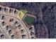 Aerial view shows the property's location near a serene pond within a residential community at 6040 Ashborough Park, Cumming, GA 30040
