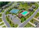 Aerial view of community pool, tennis court, playground, and parking area at 6040 Ashborough Park, Cumming, GA 30040