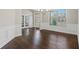 Formal dining room with decorative trim, large windows and hardwood floors at 6040 Ashborough Park, Cumming, GA 30040