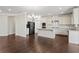 Modern kitchen featuring a center island, stainless steel appliances, and white cabinets at 6040 Ashborough Park, Cumming, GA 30040