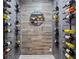 Custom wine cellar showcasing sleek metal racks and elegant bottle displays to preserve your favorite vintages at 6040 Ashborough Park, Cumming, GA 30040