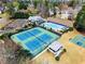 Aerial view of the neighborhood featuring tennis courts, pool and common areas at 12350 Broadleaf Ln, Johns Creek, GA 30005