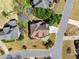 Aerial view of the home shows the roof, landscaping and proximity to other homes at 12350 Broadleaf Ln, Johns Creek, GA 30005