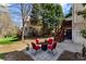 Cozy backyard patio with outdoor furniture provides an ideal space for relaxation and entertaining at 12350 Broadleaf Ln, Johns Creek, GA 30005