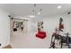 Large basement with carpet and barn doors at 12350 Broadleaf Ln, Johns Creek, GA 30005