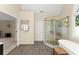 Bathroom featuring a glass shower, soaking tub, vanity, and tile flooring at 12350 Broadleaf Ln, Johns Creek, GA 30005