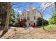 Charming home with backyard, patio, and lush landscaping at 12350 Broadleaf Ln, Johns Creek, GA 30005