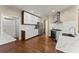 Bright kitchen with modern cabinets, stainless steel appliances, hardwood floors and white countertops at 12350 Broadleaf Ln, Johns Creek, GA 30005