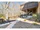 Well-maintained backyard with stone walkway and covered patio at 4183 Hill House Sw Rd, Smyrna, GA 30082