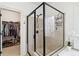 Walk-in shower with glass enclosure and access to walk-in closet at 4183 Hill House Sw Rd, Smyrna, GA 30082