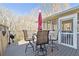 Outdoor deck with a dining table and chairs, along with a grill at 4183 Hill House Sw Rd, Smyrna, GA 30082