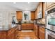 Kitchen with stainless appliances, gas cooktop, and ample countertop space at 4183 Hill House Sw Rd, Smyrna, GA 30082