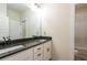 Bathroom featuring a large countertop, double sinks, and bright lighting at 5761 Dixie Hwy, Rutledge, GA 30663