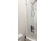 This bathroom features a shower with a mounted shower head and simple fixtures at 5761 Dixie Hwy, Rutledge, GA 30663