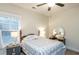 Inviting bedroom with a window and a ceiling fan at 5761 Dixie Hwy, Rutledge, GA 30663