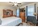 Comfortable bedroom with natural light, a ceiling fan, and lots of storage at 5761 Dixie Hwy, Rutledge, GA 30663