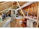 Spacious attic storage with exposed wood beams and ductwork at 7740 Sagebrush Dr, Atlanta, GA 30350