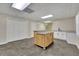 Finished basement with a wet bar and kitchen island at 7740 Sagebrush Dr, Atlanta, GA 30350