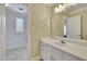 Well lit bathroom with a single sink and a window that provides natural light at 7740 Sagebrush Dr, Atlanta, GA 30350