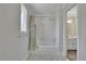 Bright bathroom with shower/tub combo and patterned shower curtain at 7740 Sagebrush Dr, Atlanta, GA 30350