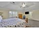 Spacious primary bedroom features vaulted ceiling, crown molding and plush carpeting, great for a relaxing retreat at 7740 Sagebrush Dr, Atlanta, GA 30350