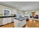 Spacious kitchen with center island, granite countertops, and stainless steel appliances at 7740 Sagebrush Dr, Atlanta, GA 30350