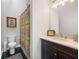 Bathroom with a vanity, toilet and shower with patterned curtain at 120 Ralph Mcgill Ne Blvd # 312, Atlanta, GA 30308