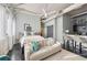 Open-concept living area with modern furnishings, beams, and a partial kitchen view at 120 Ralph Mcgill Ne Blvd # 312, Atlanta, GA 30308