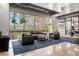 Bright modern lobby with comfortable seating, large windows offering views, and stylish decor creating a welcoming space at 120 Ralph Mcgill Ne Blvd # 312, Atlanta, GA 30308