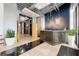 Contemporary lobby features a reception desk, tiled floors, plants, and modern lighting for a welcoming atmosphere at 120 Ralph Mcgill Ne Blvd # 312, Atlanta, GA 30308