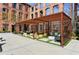 Stylish outdoor lounge area with comfortable seating and pergola providing shade and privacy at 170 Boulevard Se # E127, Atlanta, GA 30312