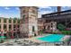 Inviting pool area with lounge chairs surrounded by unique brick architecture and lush greenery at 170 Boulevard Se # E127, Atlanta, GA 30312