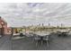 Relaxing rooftop patio with stylish seating and stunning cityscape views of the Atlanta skyline at 170 Boulevard Se # E127, Atlanta, GA 30312