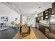 Modern dining room with sleek table, stainless steel appliances, and an open layout with lots of natural light at 170 Boulevard Se # E127, Atlanta, GA 30312