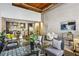 Bright living room featuring modern decor, exposed beams, and a spiral staircase leading to the second level at 170 Boulevard Se # E127, Atlanta, GA 30312