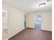 Neutral bedroom with carpeted floors and two entry doors at 189 Privet Cir, Suwanee, GA 30024