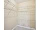 A walk-in closet featuring multiple white wire shelves for ample storage at 189 Privet Cir, Suwanee, GA 30024