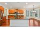 Spacious kitchen featuring stainless steel appliances, an island with bar seating, and natural light at 189 Privet Cir, Suwanee, GA 30024
