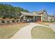 Community pool with a covered seating area and landscaping, providing a resort-like feel at 189 Privet Cir, Suwanee, GA 30024