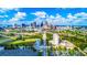 Aerial view of Atlanta's skyline on a sunny day, highlighting expansive cityscape and green spaces at 2955 Jefferson St, Austell, GA 30106